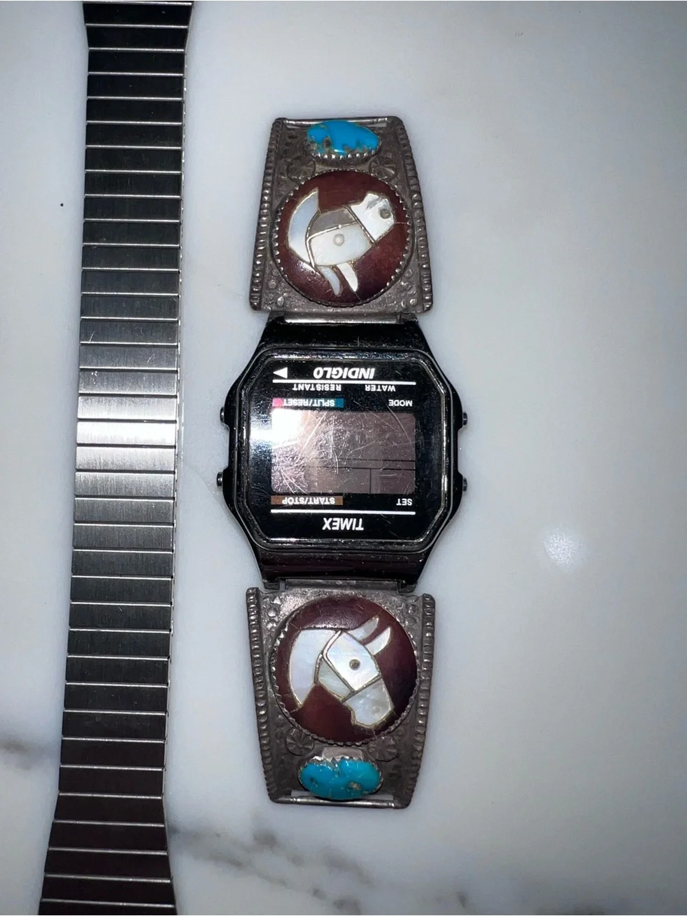 Zuni Native American watch tips with Timex watch